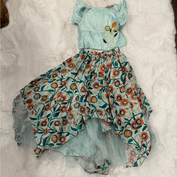 Little muffet Floral Embroidery
Top With Asymmetric Layered Net Frilly
Lehenga - Picture 3 of 11
